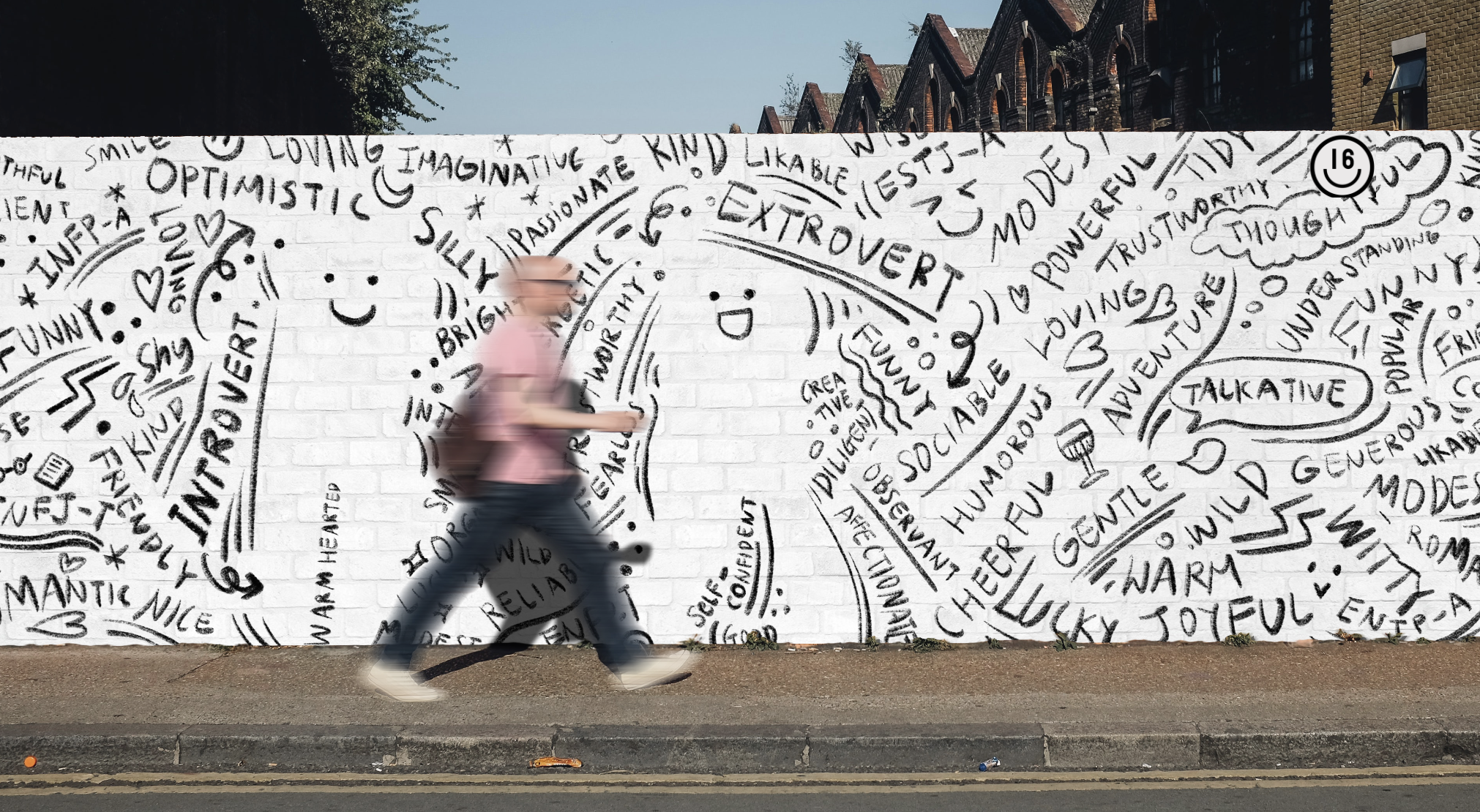Interactive street mural filled with 16 Personalities smiley faces and lettering