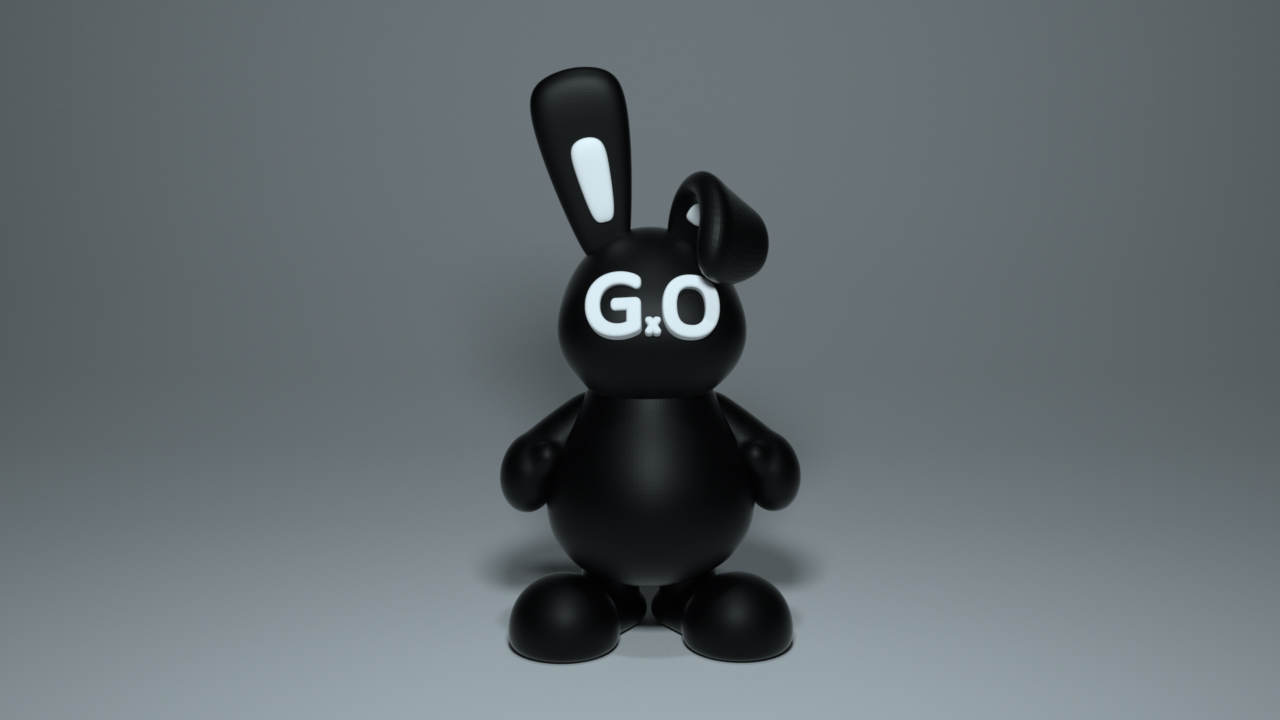 Black G:O rabbit art toy on a gray studio background